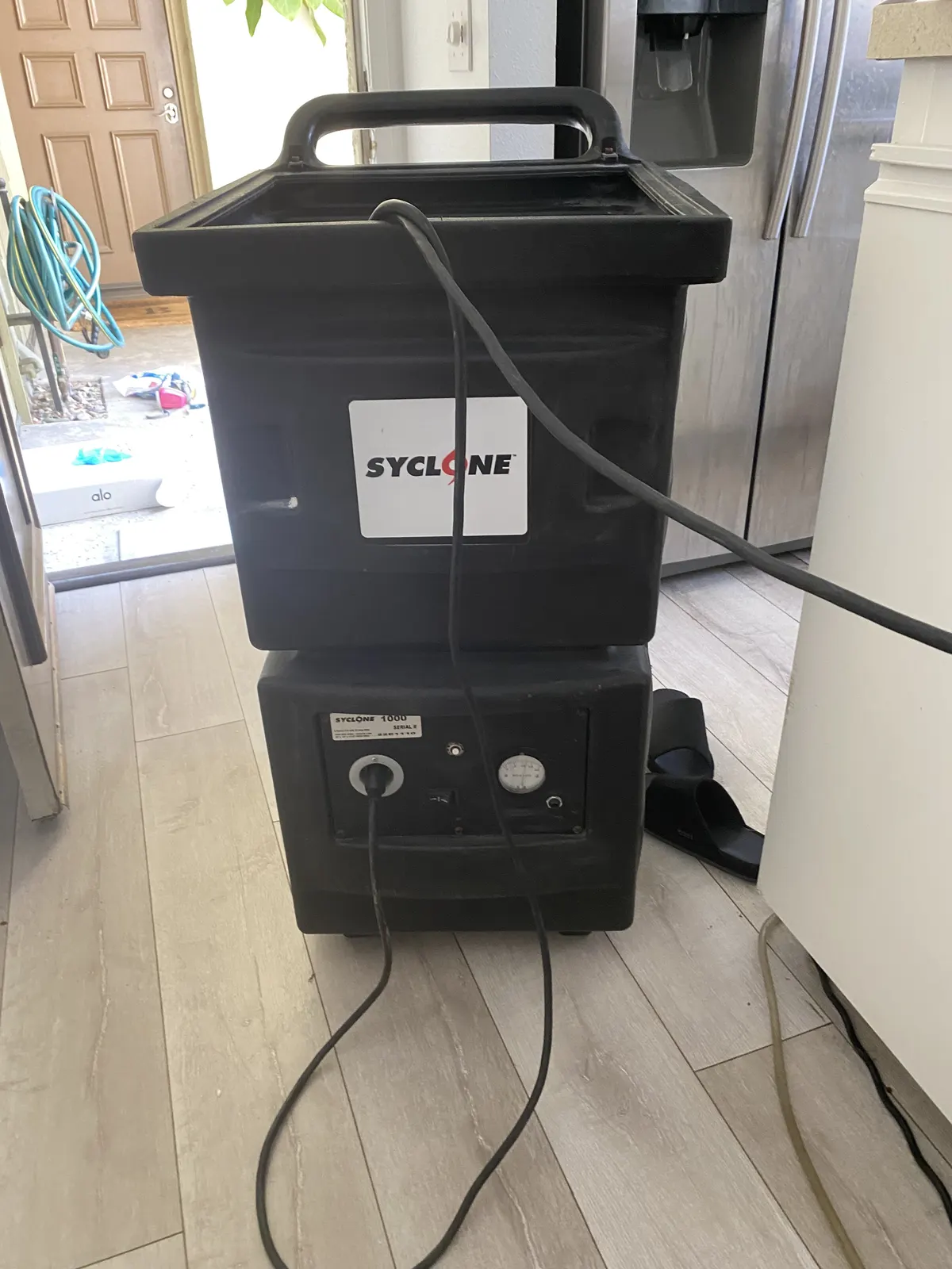 Portable air filtration unit running indoors