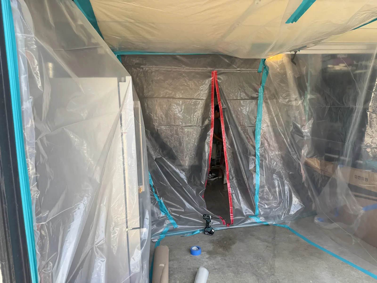 Plastic containment enclosure with a zipper entry sealed with tape